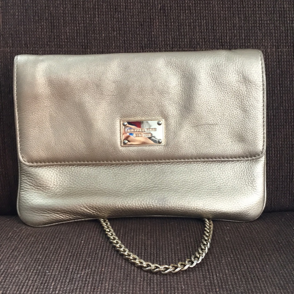 Michael Kors gold shoulder bag and clutch